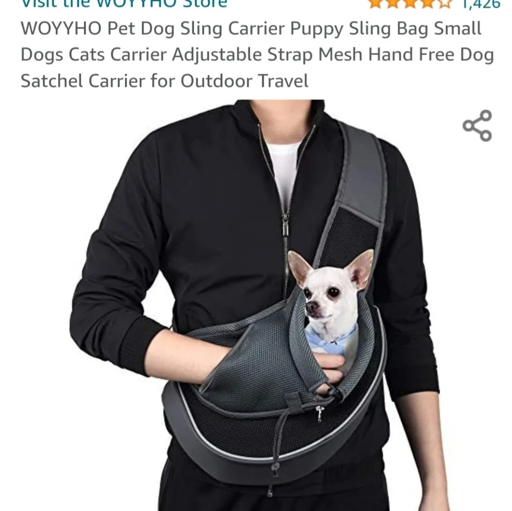 Small black dog sling carrier